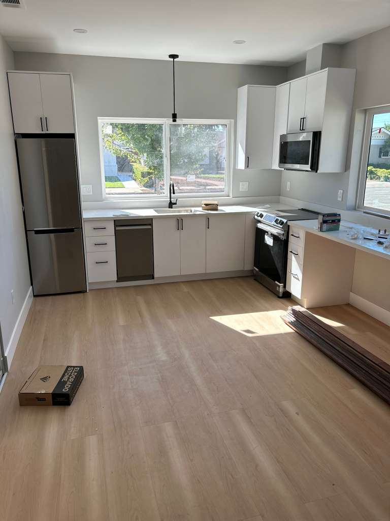 Modern kitchen remodel with white cabinets in Bay Area home